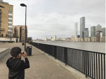 boy by the river thames